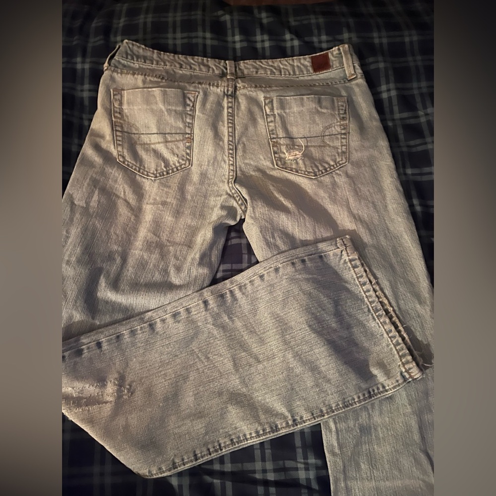 WOMEN SZ 10 REG
AMERICAN EAGLE TRUE
BOOT LIVE YOUR LIFE HOLEY
JEANS